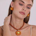 Lena Orange Resin Octagon and Topaz Crystal Pendant