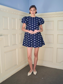 The Golden Hour Mini Dress in Navy Polka Dot