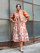 Sleeveless SUE SARTOR Flounce Dress in Terracotta Marigold