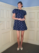 The Golden Hour Mini Dress in Navy Polka Dot