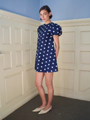The Golden Hour Mini Dress in Navy Polka Dot