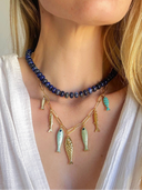The Silver Wren Necklace Desert Tide Necklace – Gold Chain with Playful Fish Charms